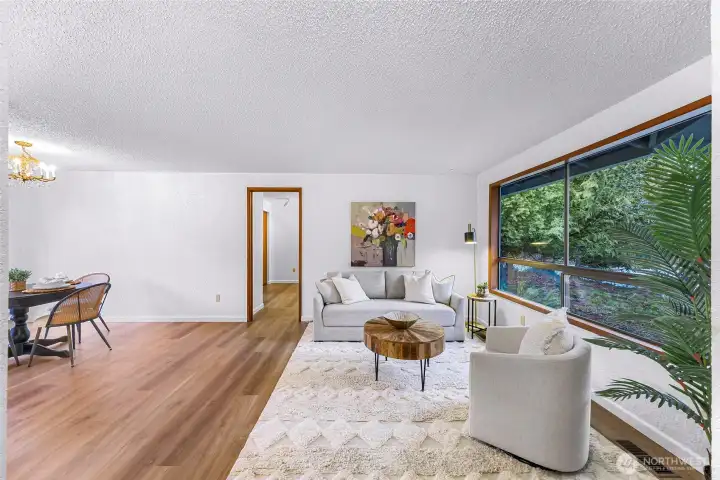 Great flow between entry, living, and dining room.