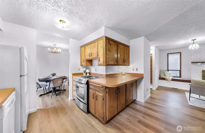 Kitchen is open to the dining room and the den.