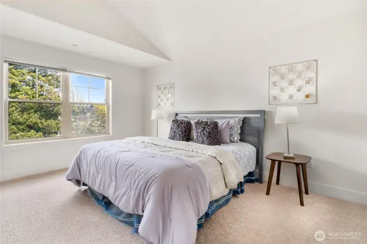 Upstairs Primary Bedroom with Vaulted Ceilings