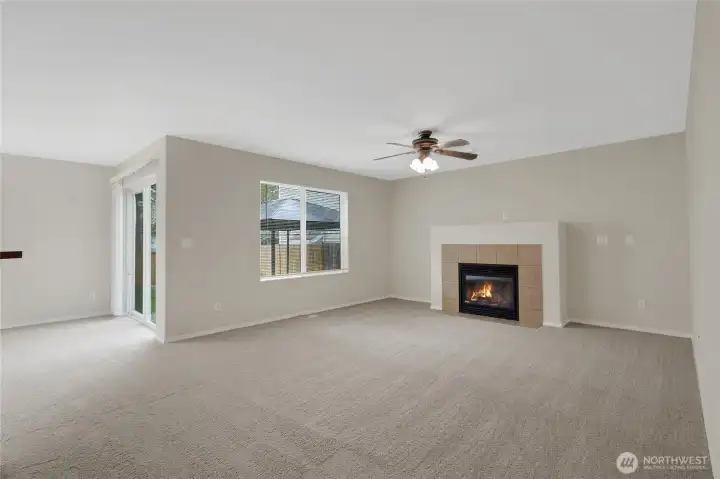 Family room with bright natural light and slider to backyard