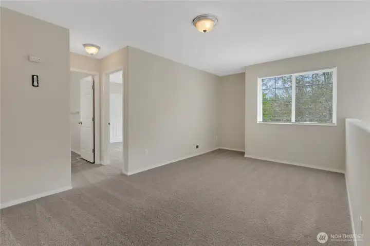 Upstairs loft...perfect for office, crafting or turn into a 4th bedroom.