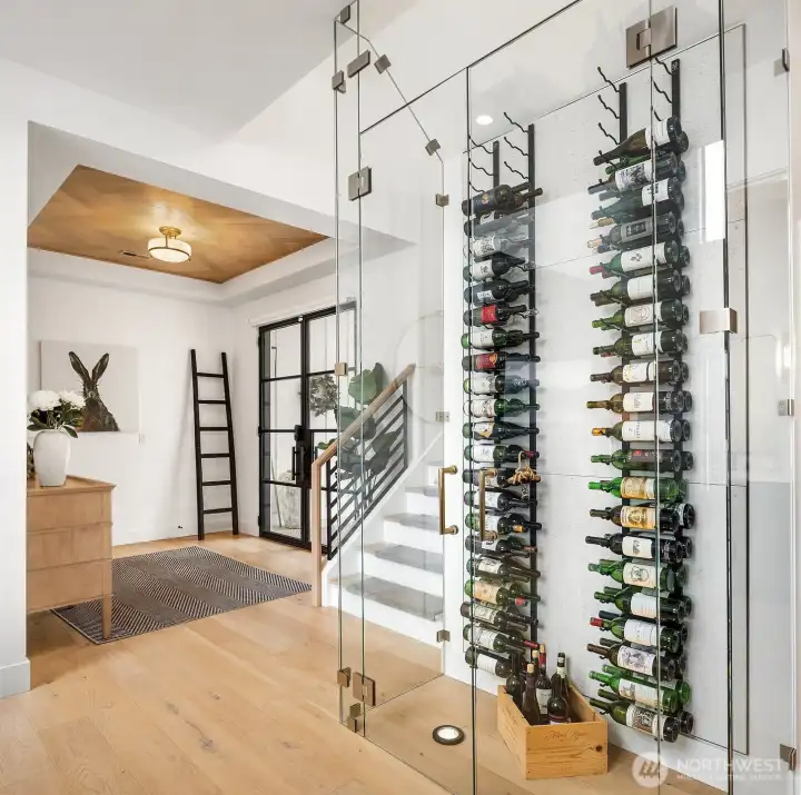 Gorgeous wine cellar delivers a sense of WOW the minute you step in the front door!
