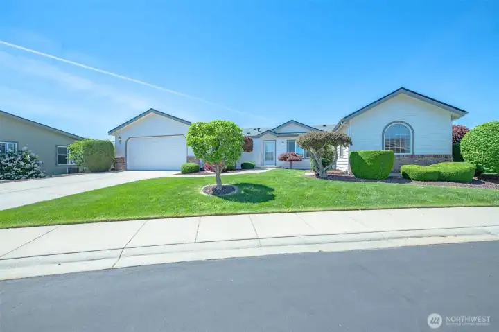Quiet location, level lot, sidewalks, and a trailhead just across the street!