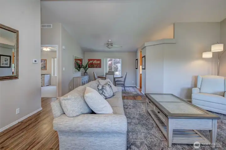 Come on in! Step into a tiled foyer, then into a gracious, bright living area. Notice the nice furnishings!
