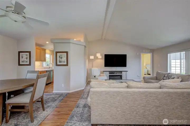 Living room and formal dining room are central to this split-bedroom design