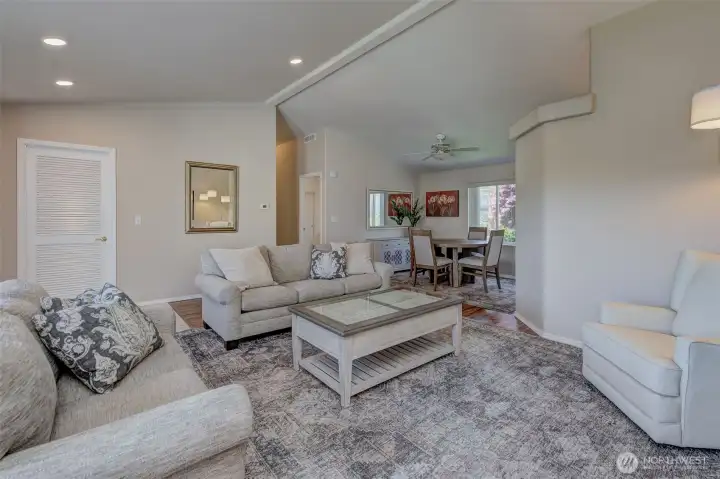 Living room has recently-added recessed lighting for extra brightness