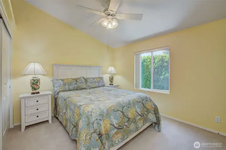 Bedroom 3 offers guests a quiet, secluded space with a full-sized closet and queen bed
