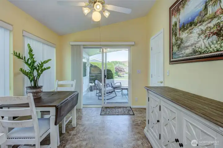 Enjoyable Breakfast room with patio access for outdoor cooking and a HUGE walk-in pantry (behind door on right)