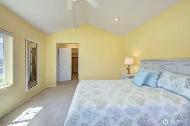 Primary bedroom enjoys total privacy at the north end of the house. Massive walk-in closet through the doorway (not shown)