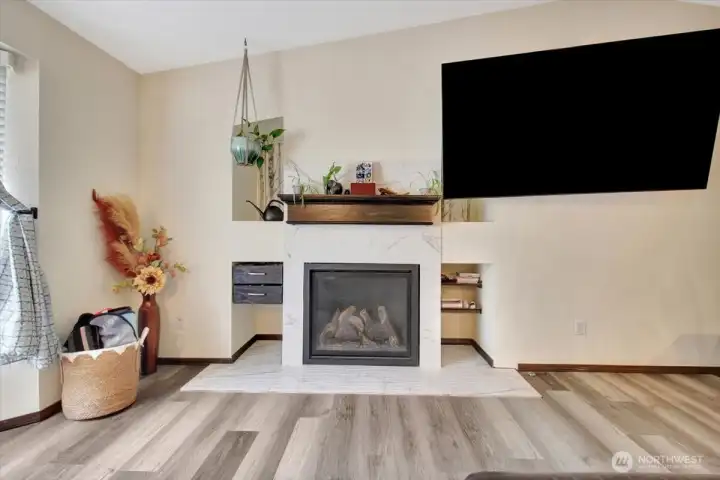 Gorgeous gas fireplace with new surround and convenient built-ins. Gorgeous gas fireplace with new surround and convenient built-ins.