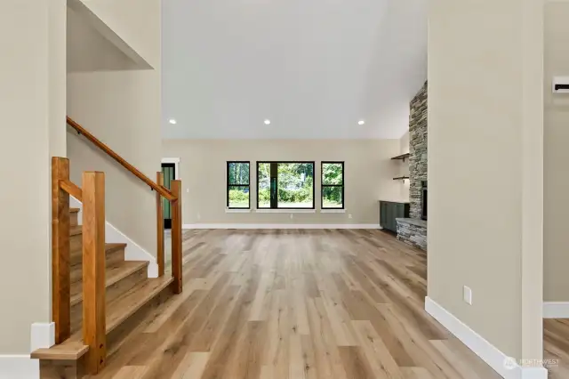 Welcome home. Check out this gorgeous entry to this custom built home with so many high end features to make your life easier.  Note: 14 ft Cathedral ceilings and lots of windows make the home light and bright throughout.