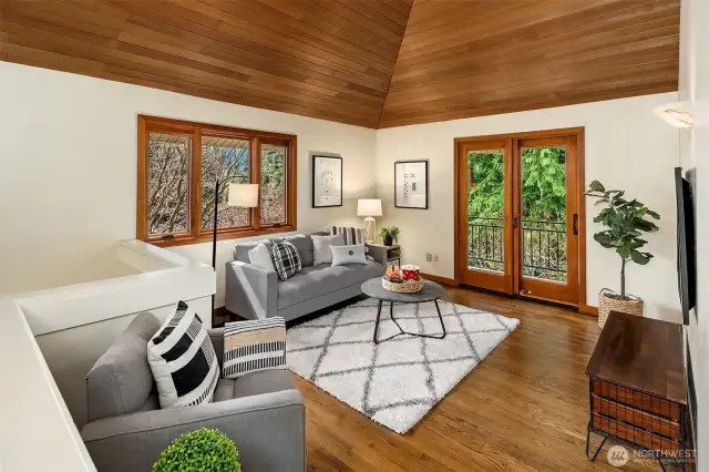 Vaulted upstairs bonus/rec room provides great flex-space.