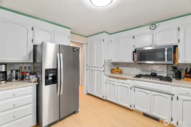 This kitchen space features tons of smart storage.