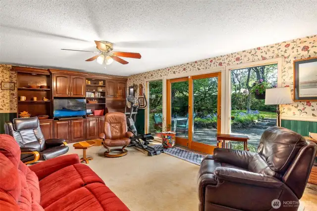 Relax in the family room  while enjoying the views of the back yard.