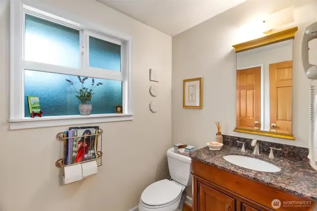 Powder room/half bath located off the laundry room.