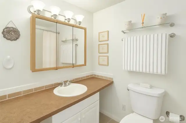Primary bathroom/en-suite. Digitally enhanced using AI.