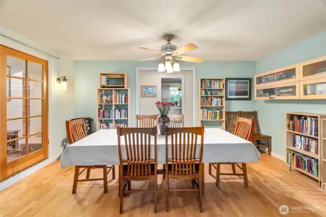 View of dining room. Kitchen is in the background.