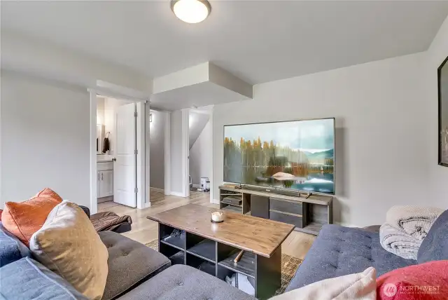 Lower level Bonus room adjoins to half bath and accesses 2 car garage with ample storage