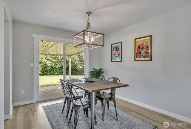 Dining Room with slider adjoins to patio and level backyard