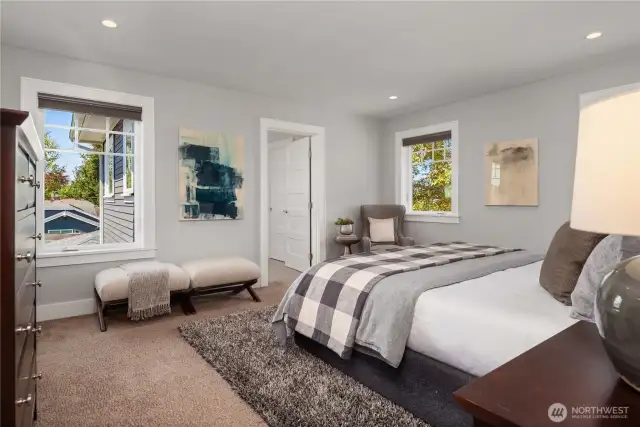 The primary bedroom features a king sized bedroom with walk-in closet and private bath.