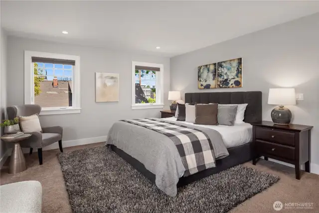The primary easily handles a king sized bed and the largest of bedroom furniture.