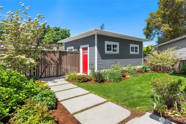 The 2 car garage is just beyond the beautiful backyard along with 2 off-street parking spaces.
