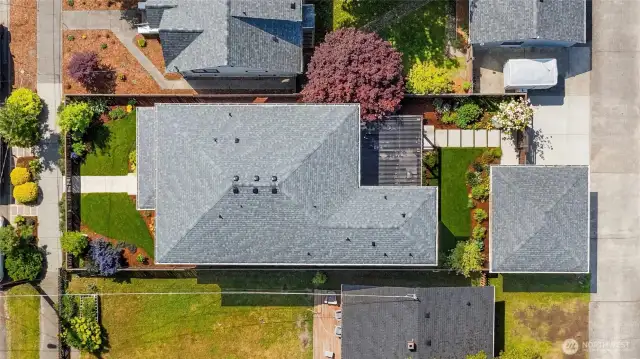 This shot looking down displays the true pride-of-ownership of this property. The 2 car garage is to the right with the 2 off-street parking spaces just above it.