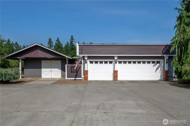 Detached 3-car garage is 962 sqft of space + barn on the left hand side in 20x19!