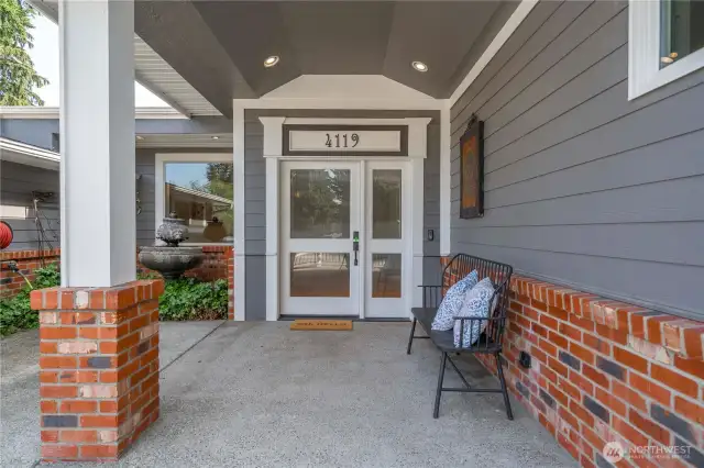Stunning porch welcomes you into your new home with a fountain off to the left!