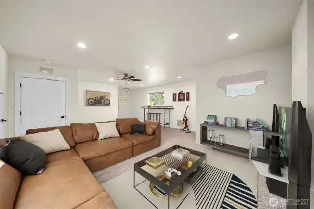 Virtually staged upper level bonus room - Huge living area with its own full bath that could be another suite for multi-gen living, or theatre/game room etc.