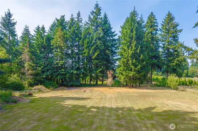 This spacious and level shy 2 acre lot is ideal for hobby farming, animals, horses, or future projects!