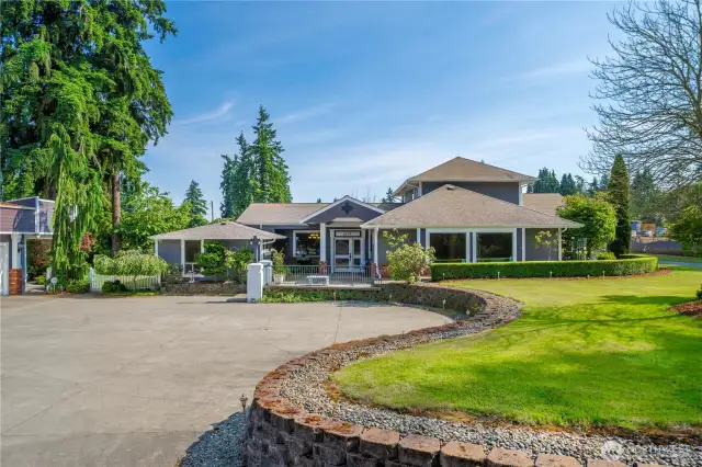 Feel the privacy of your own oasis getaway with  this home that’s tucked off the road on a private drive!