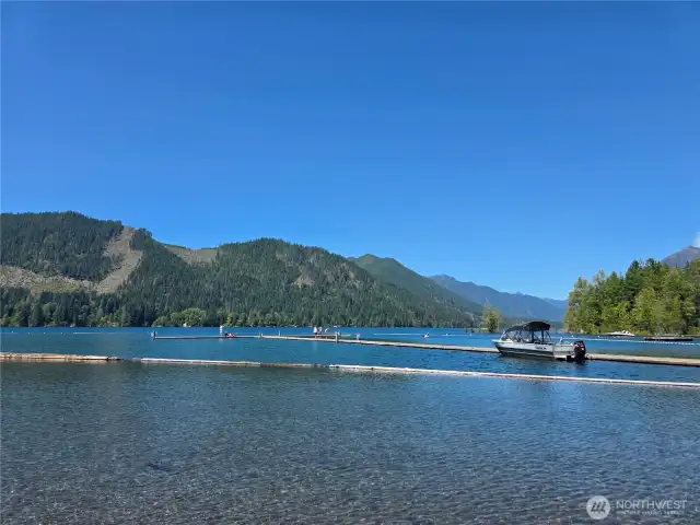 community beach area with dock/moorage