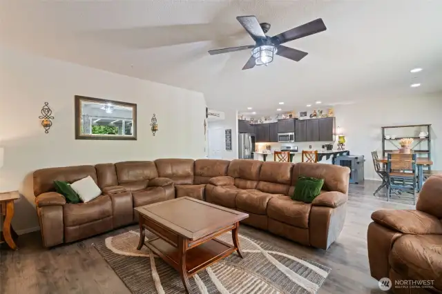 great room, ceiling fan and fireplace