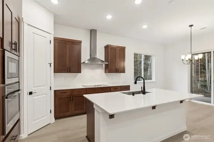 ***Actual Home ***  Kitchen with large island and pantry