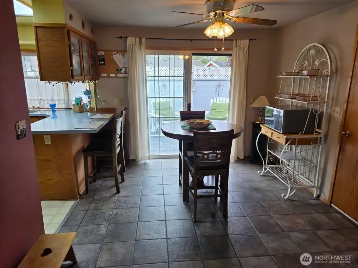 Dining room opens into backyard deck seating