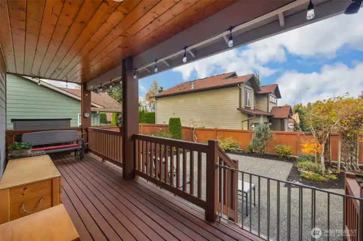 Attractive deck leads to patio and yard.