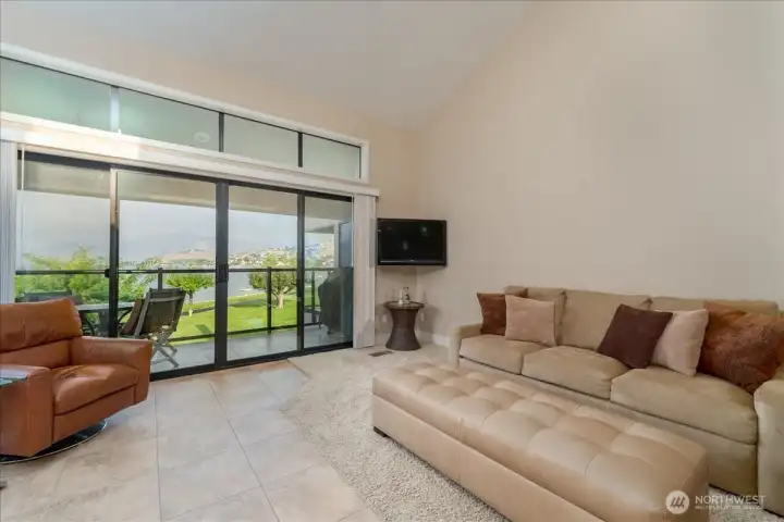 This one bedroom & one bathroom units that has been fully updated.  This couch here (queen sleeper) and both TV's convey with this sale.