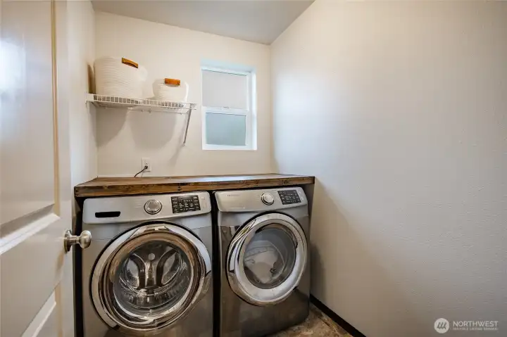 Downstairs dedicated laundry room