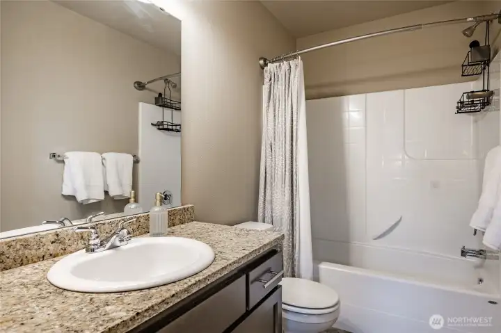 Spacious upstairs guest bathroom