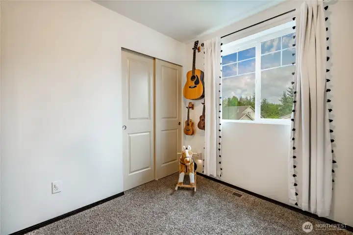 Bedroom 2 closet & natural light