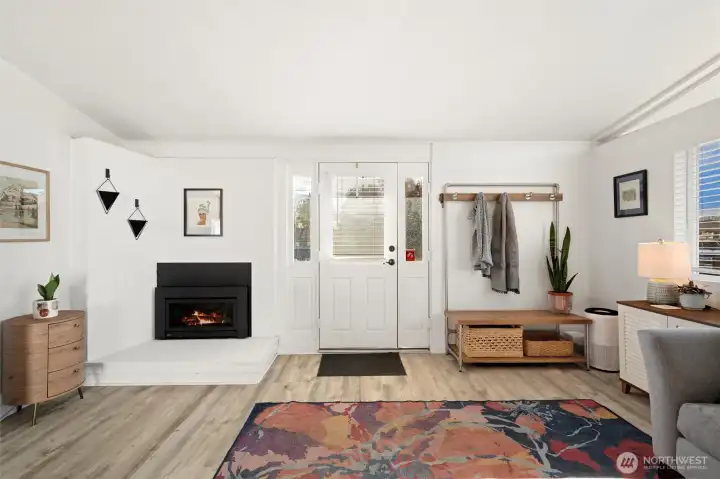 South facing entry door has an extra side panel that can swing open for a larger access point.