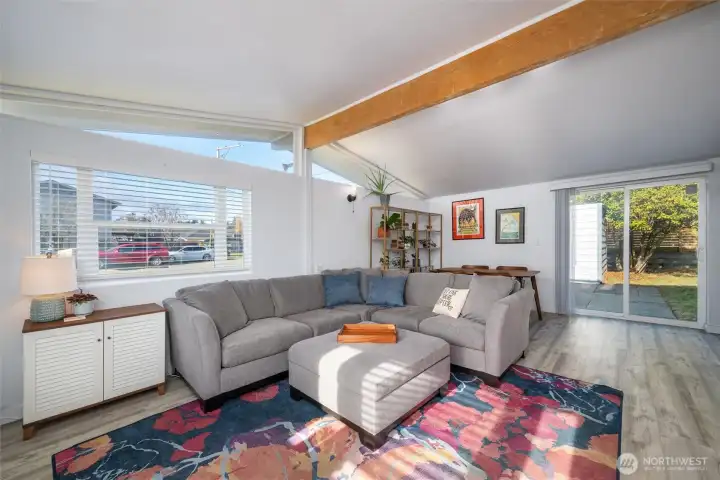 Sun soaked living room with ample windows.