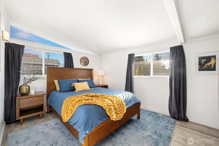 Southeast facing bedroom is drenched in natural sunlight.