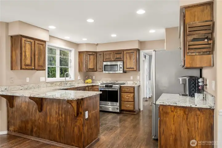 Walk through the entrance around to the rear of the house to find the perfect open concept you were looking for