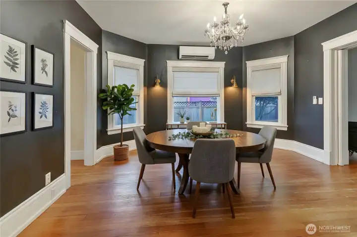 A sizeable dining room accessible from anywhere on the main floor. *virtually staged
