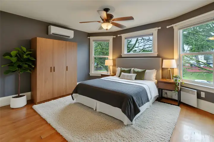 The upstairs primary suite. *virtually staged