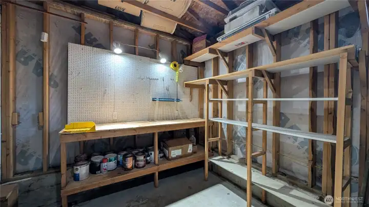 Powered and lit work space and storage.