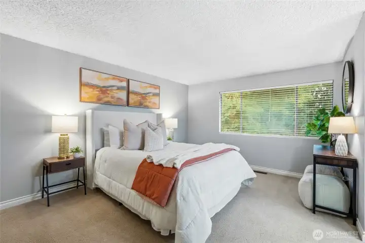 Peaceful upstairs sanctuary with natural light.