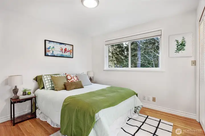 Third bedroom. All upstairs bedrooms feature hardwood floors.